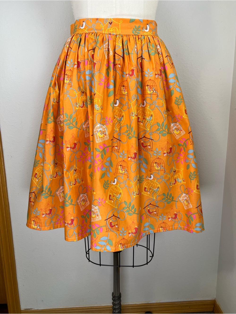 Bright Orange Circle Skirt with Birdcage Print
